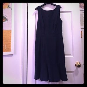 Navy work dress with ruffle