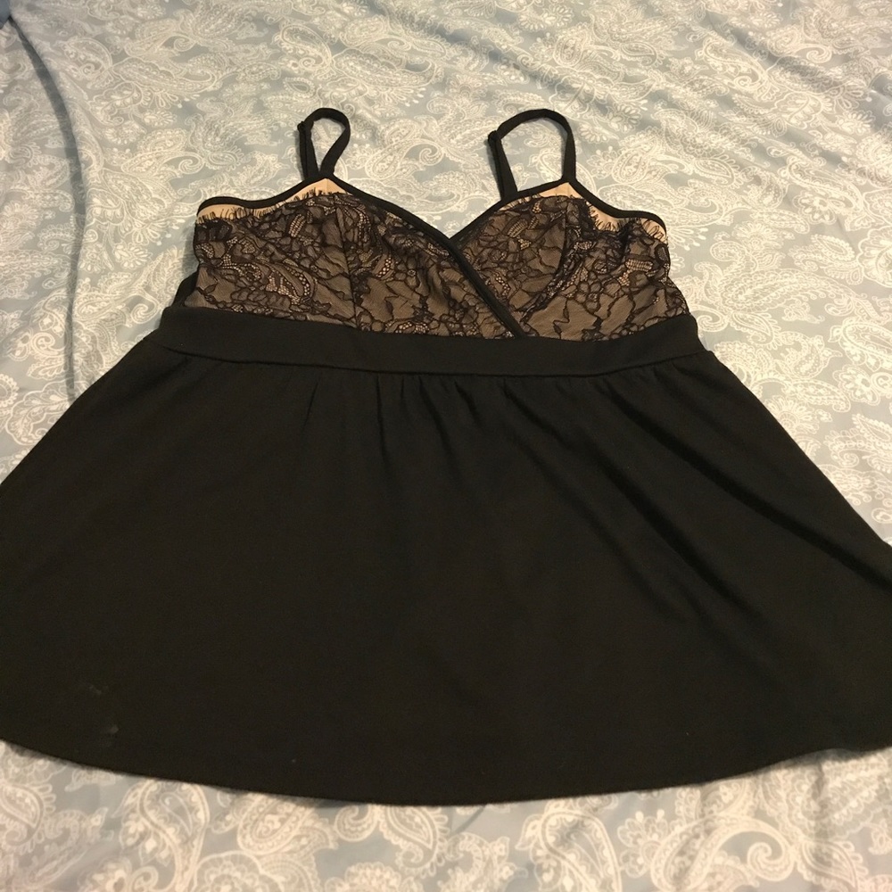 Torrid back and flesh colored top.