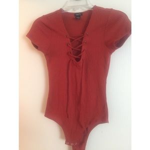 Leotard- like Rue 21 t-shirt.