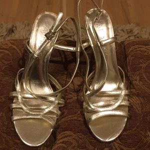 GOLD ALDO STRAPPY HEELS
