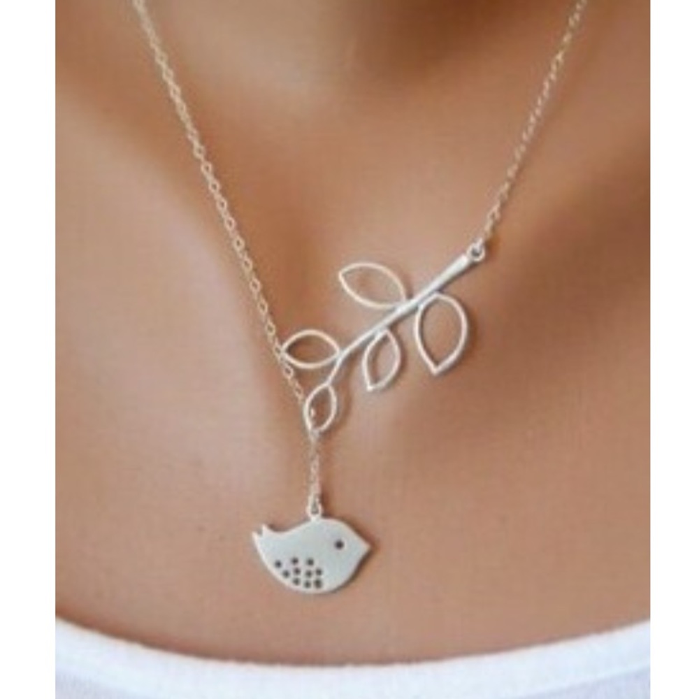 silver singing birdie necklace and earring set