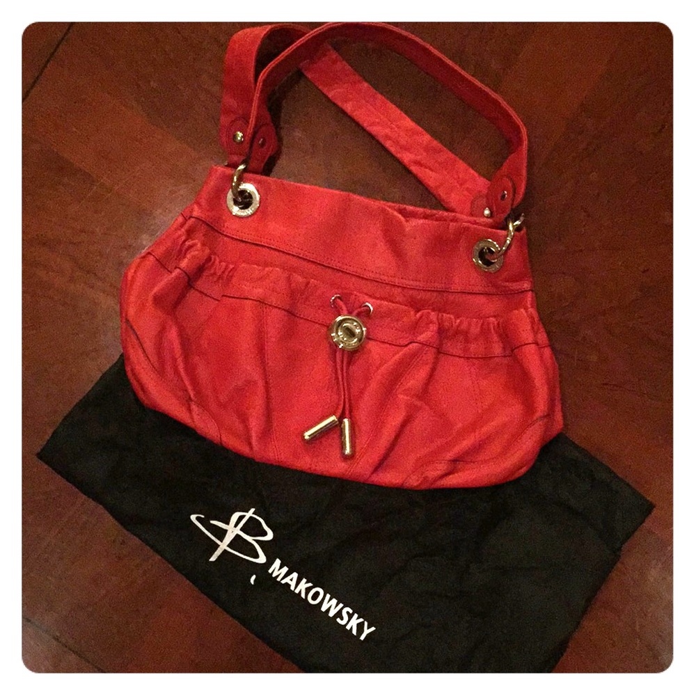 Large red Makowski over the shoulder bag.