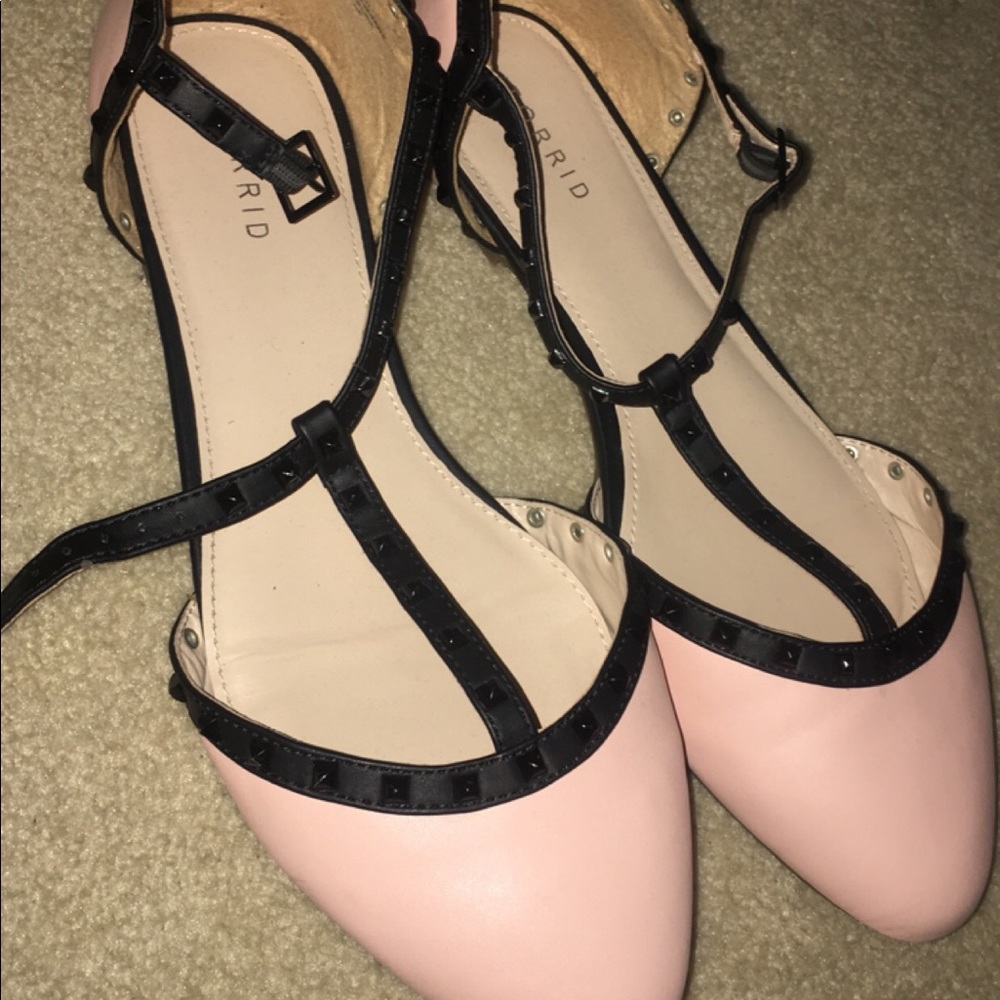 Pink and black flats
