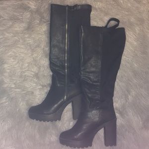 Torrid extra wide calf boots.