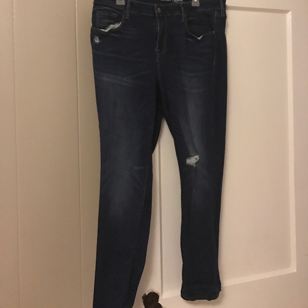 Dark wash slightly distressed jeans