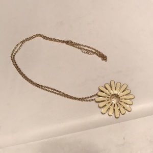 Long gold chain necklace with bold flower