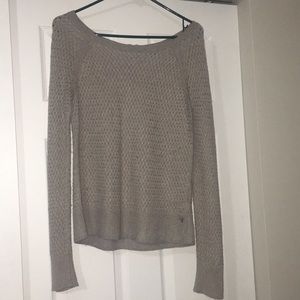 thin sweater with a quarter zip in the back