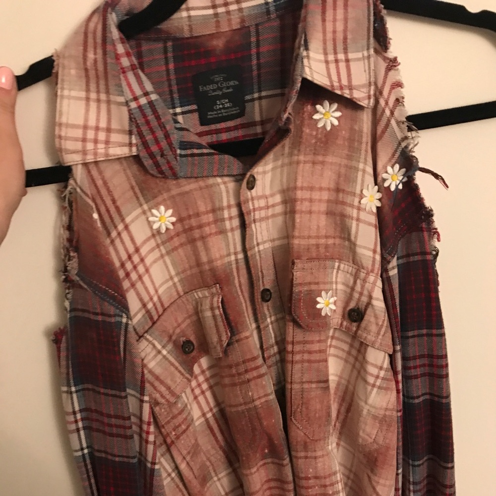 "Cold shoulder" distressed plaid shirt
