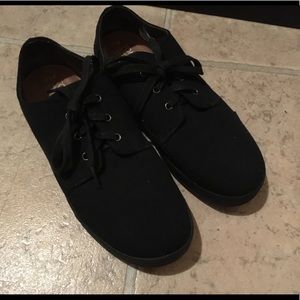 Black women's Toms lace-ups.