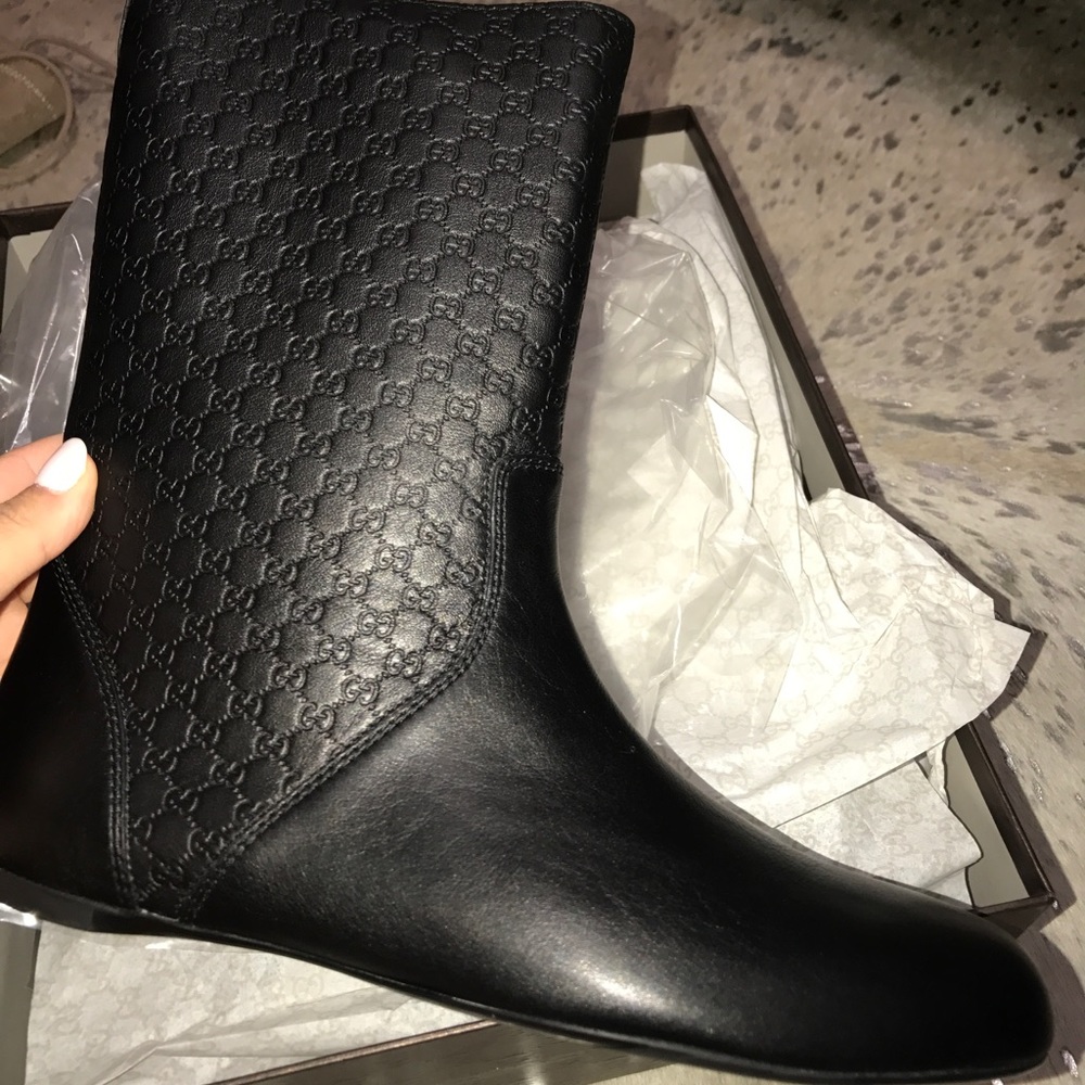Gucci boots. Never been worn. Comes with box
