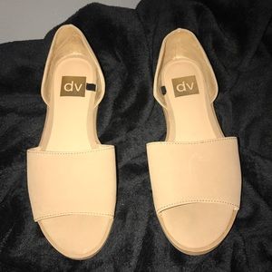 Beige / nude flats .