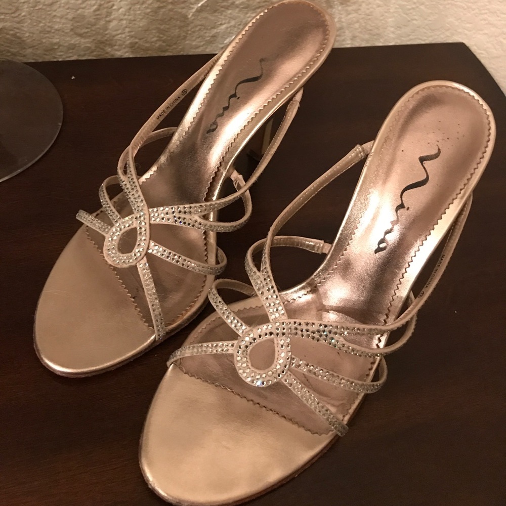 Nina heals in size 7.5 sparkly and dressy