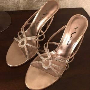 Nina heals in size 7.5 sparkly and dressy
