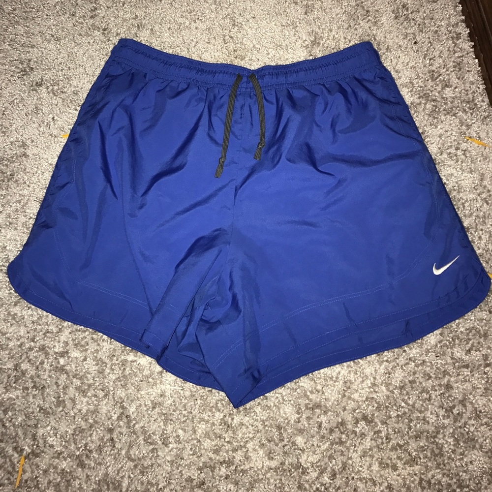 Blue Nike Dri-Fit running shorts
