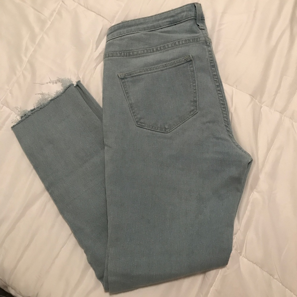 Distressed hem jeans
