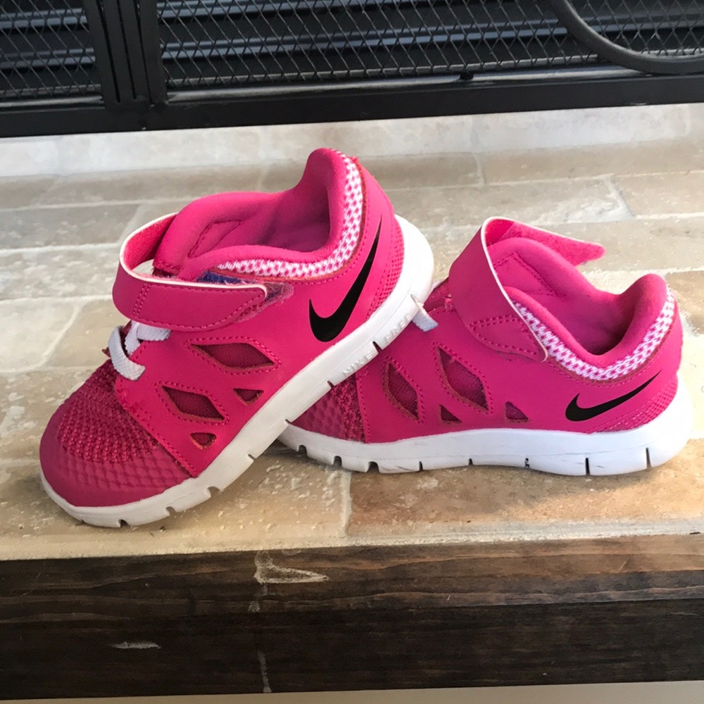 Girl pink Nike size 8