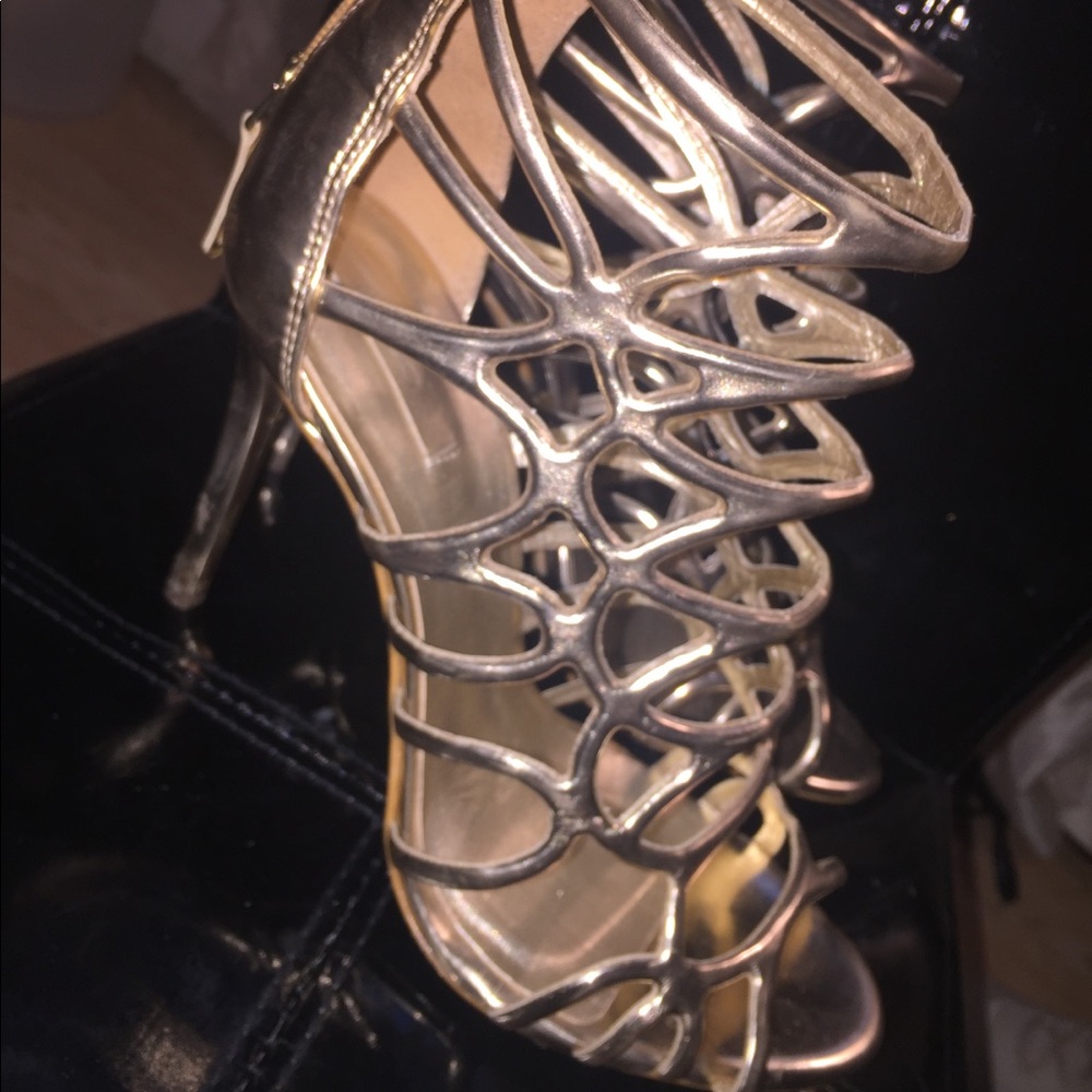 ALDO gold heels.