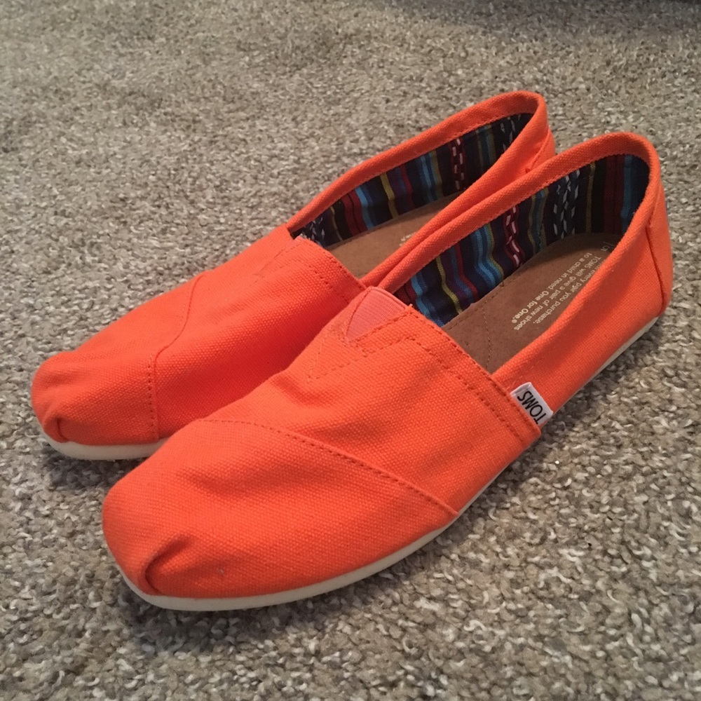 Orange Toms brand new, never worn