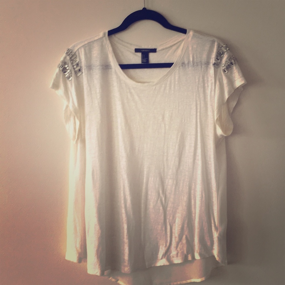 White short sleeve top with stones on the shoulder
