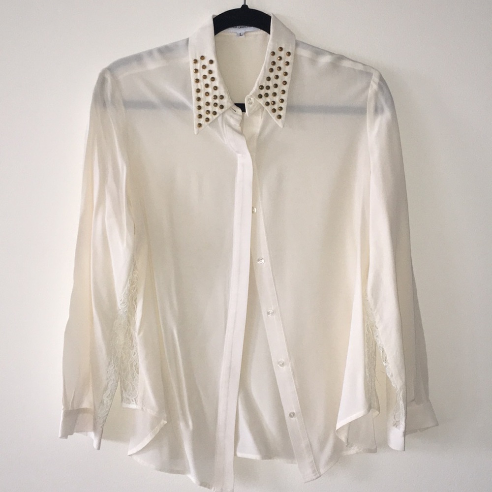 Hot cream top with lace detailing and studs