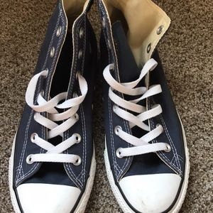 Blue women's high top converses