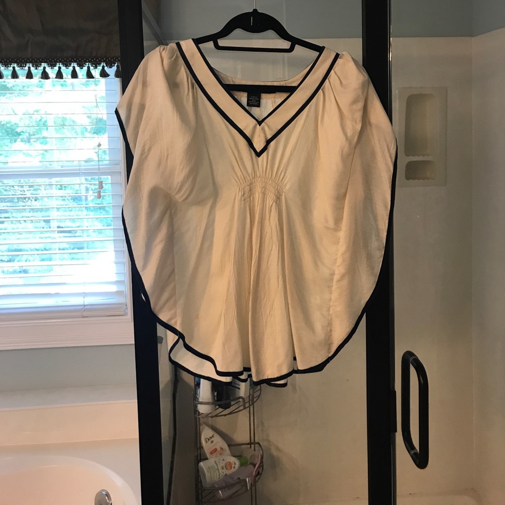 Top with winged sleeves