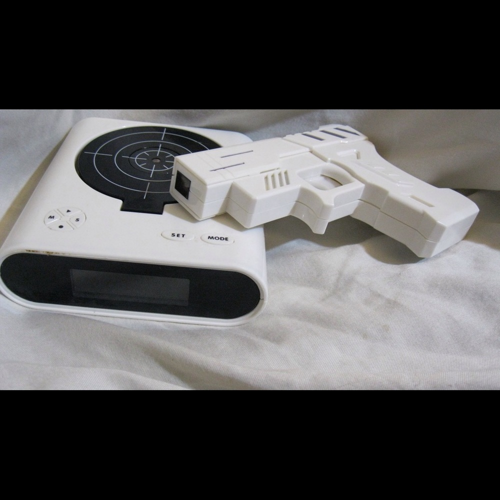 Gun alarm clock