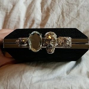 Brass knuckles clutch