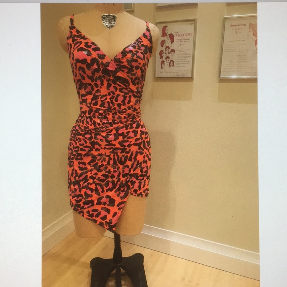 Asymmetrical neon black and orange dress