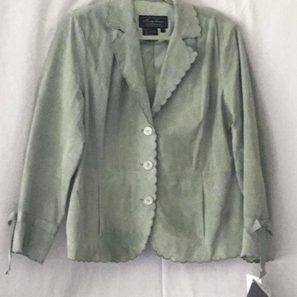 Swede jacket, scalloped trim never worn.