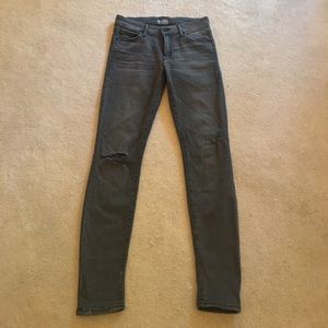 Grey distressed skinny jeans