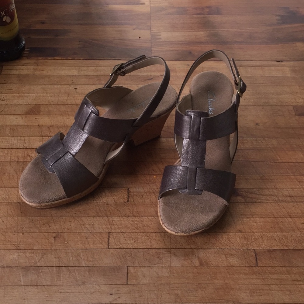 Clarks leather wedge like sling back sandal size 8