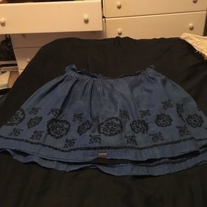 A casual blue and grey skirt.