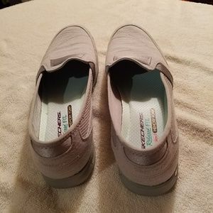 Grey Skechers relaxes fit memory foam slip on