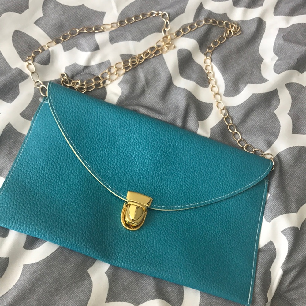 Turquoise envelope crossbody!