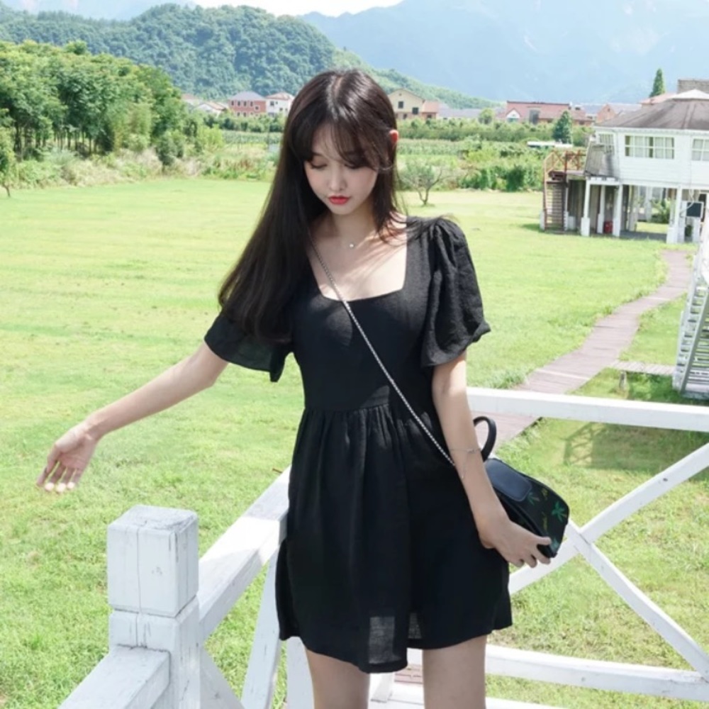 Black tie back mini dress