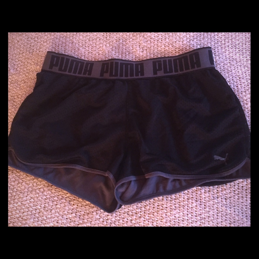 Black PUMA shorts with grey accents.