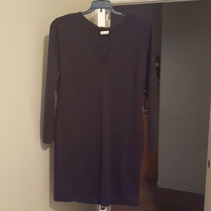 Black simple dress with peekhole neck with silver