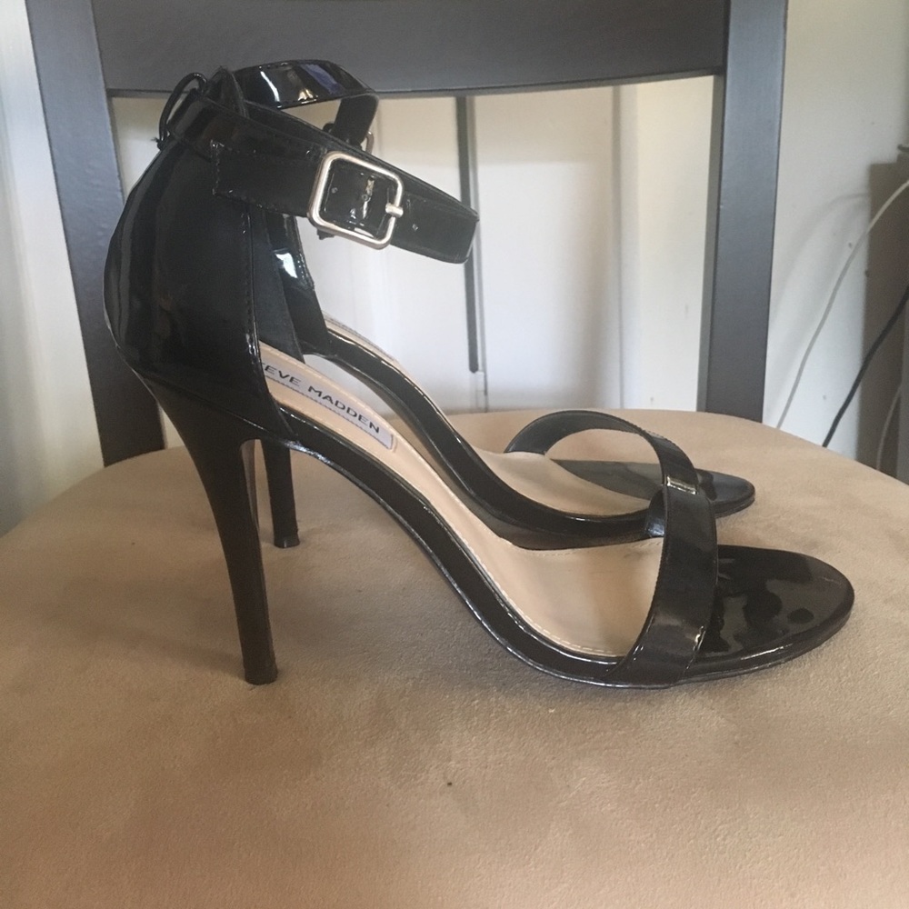 Worn once classic black patten leather tstrap
