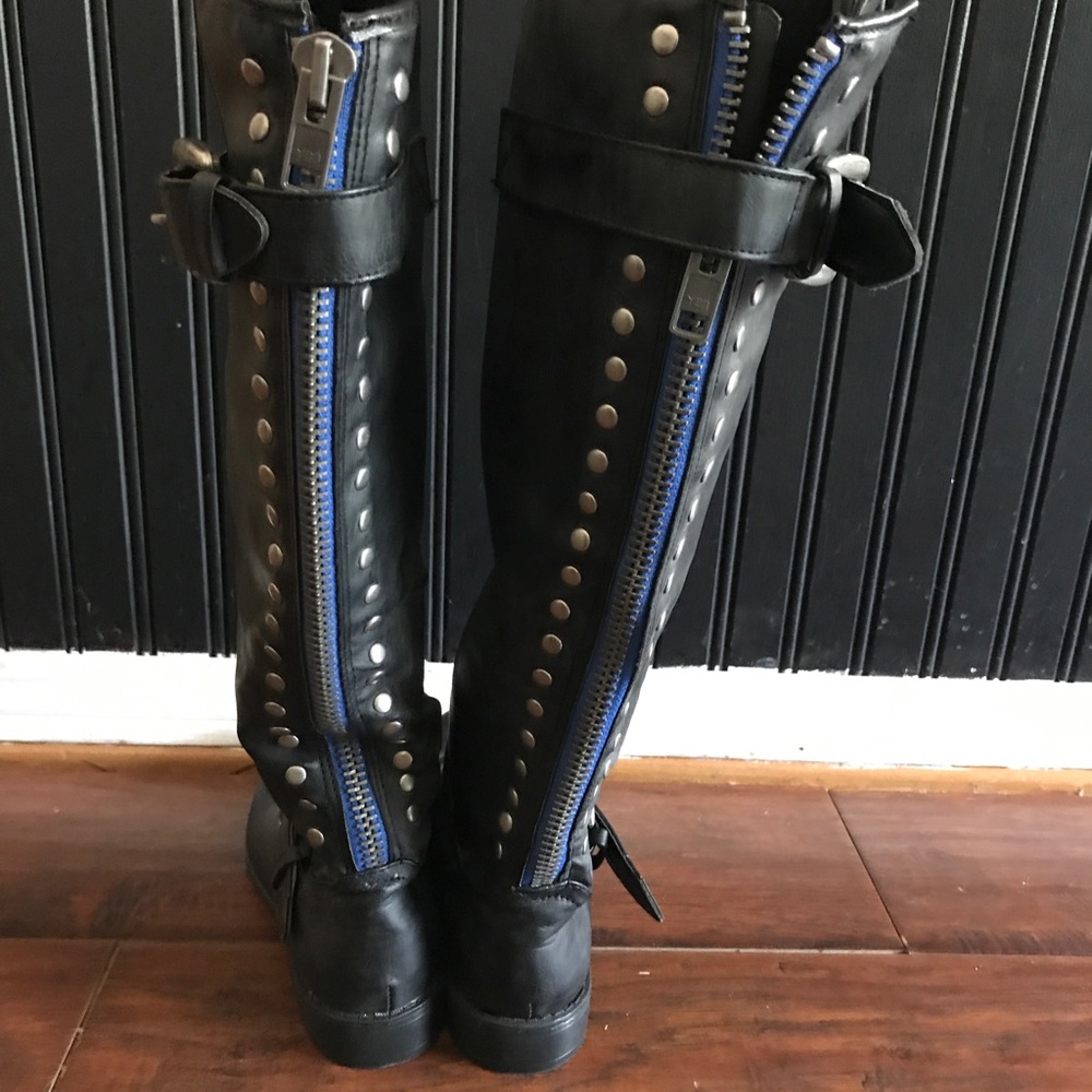 Over the calf black boots