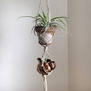 Double tiered macramé plant hanger.