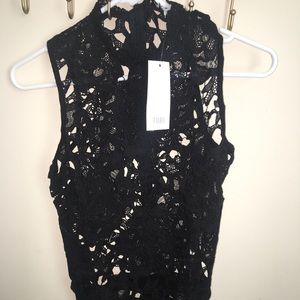 Black lace body suit from Tobi. Size medium.