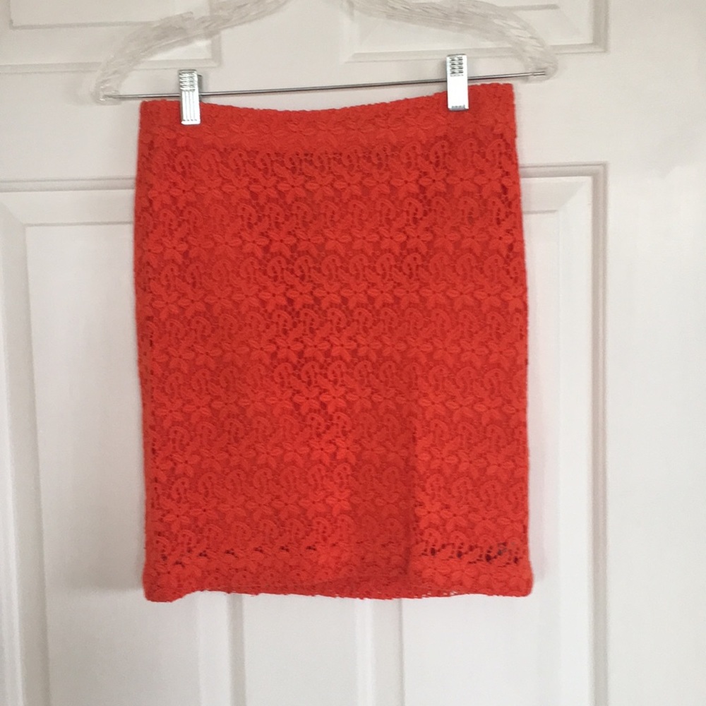 A coral red skirt
