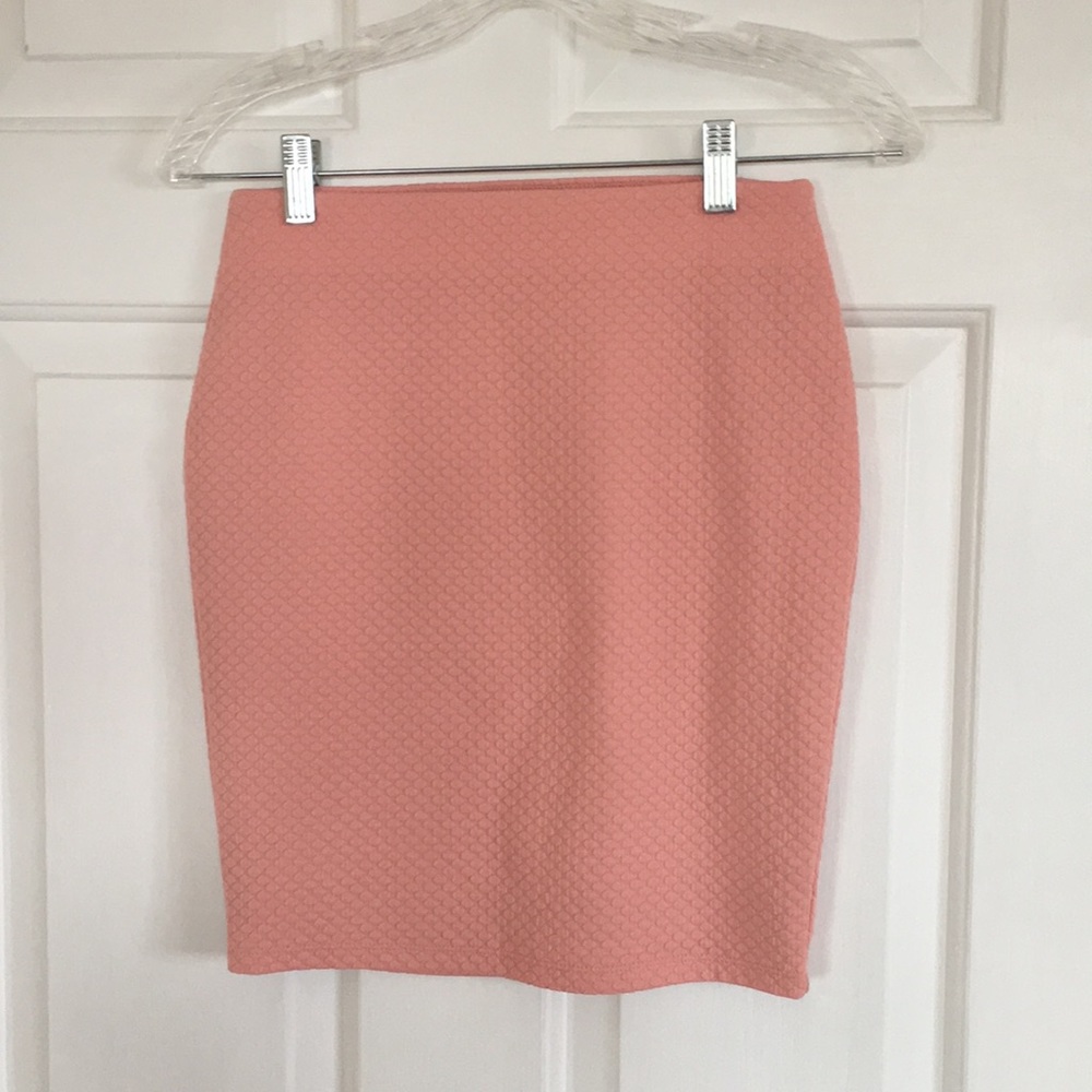 A blush pink stretchable skirt