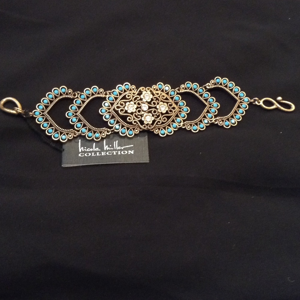 Nicole Miller Collection gold filigree bracelet