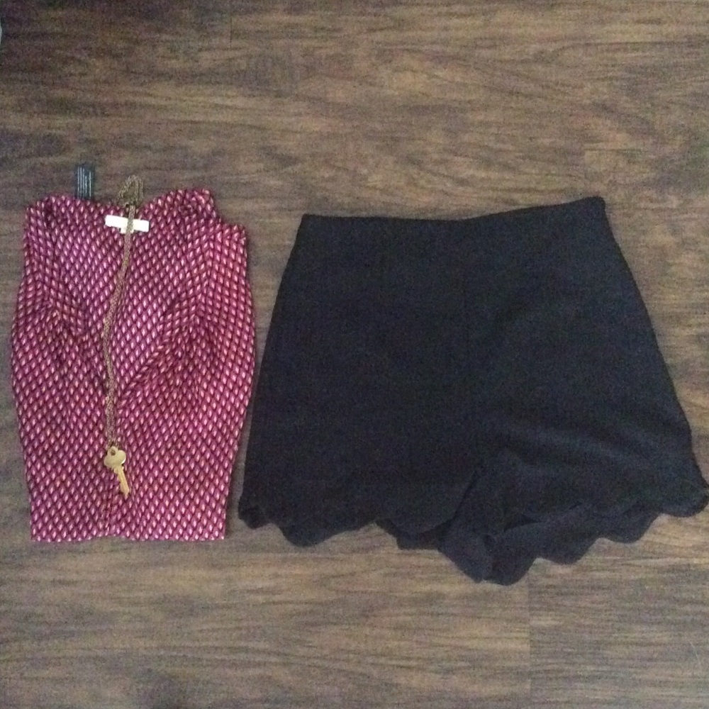 Black high waisted shorts with cute curved detail