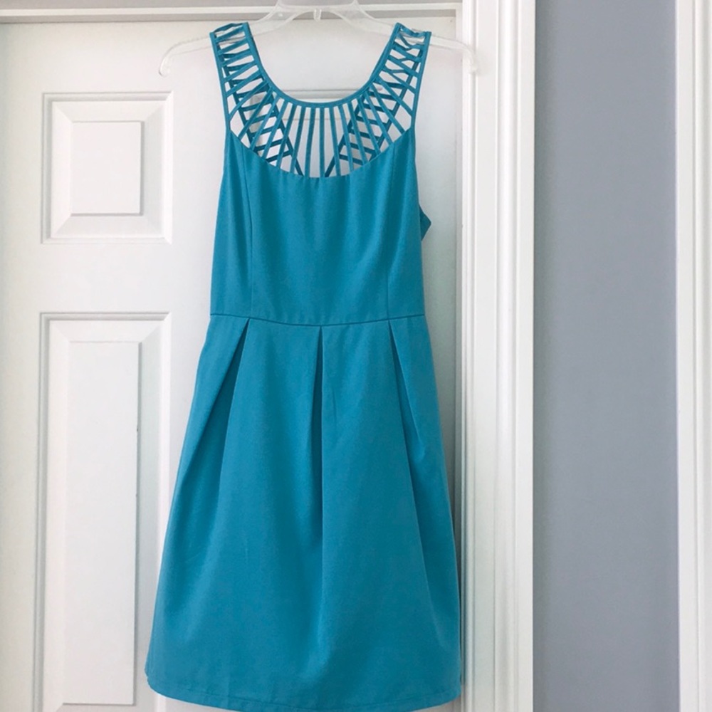Teal dress with cutouts