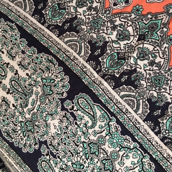 A mini dress with many patterns on it. - Picture 3 of 3