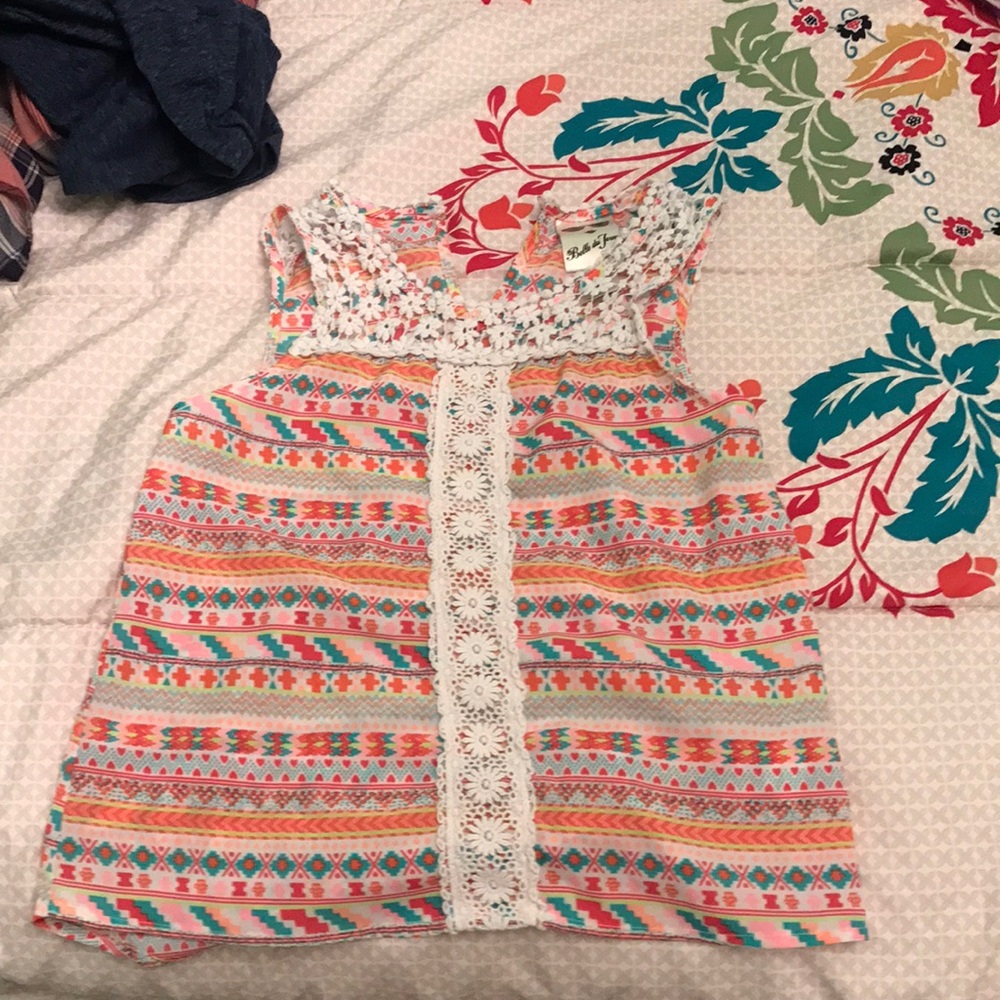Size medium in kids, colorful tank top.