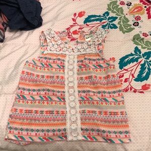 Size medium in kids, colorful tank top.